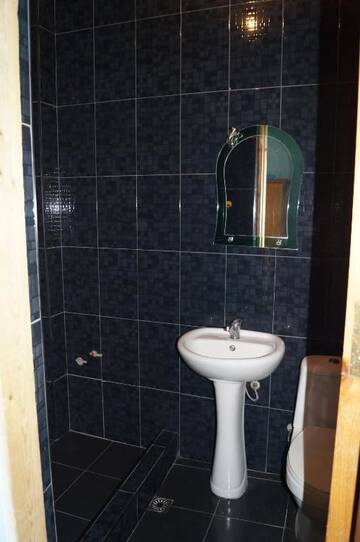 Фото номера Большой двухместный номер с 1 кроватью Гостевой дом Olesya Guesthouse г. Мцване-Концхи 7