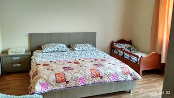 Фото номера Трехместный номер с видом на горы Гостевой дом Olesya Guesthouse г. Мцване-Концхи 5